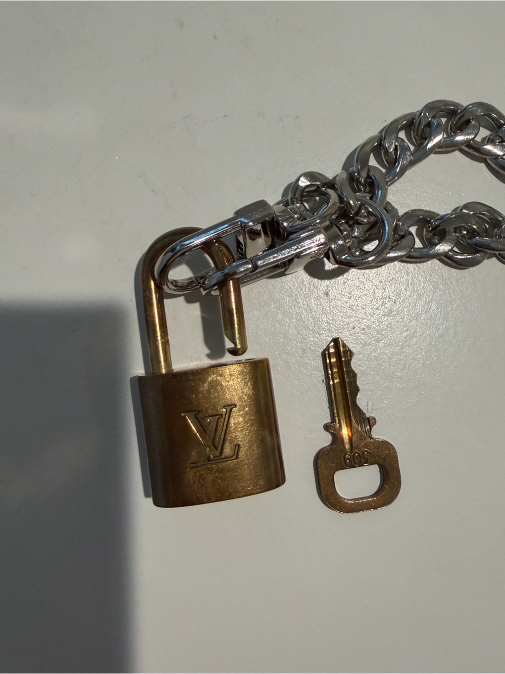 Authentic Louis Vuitton lock and key